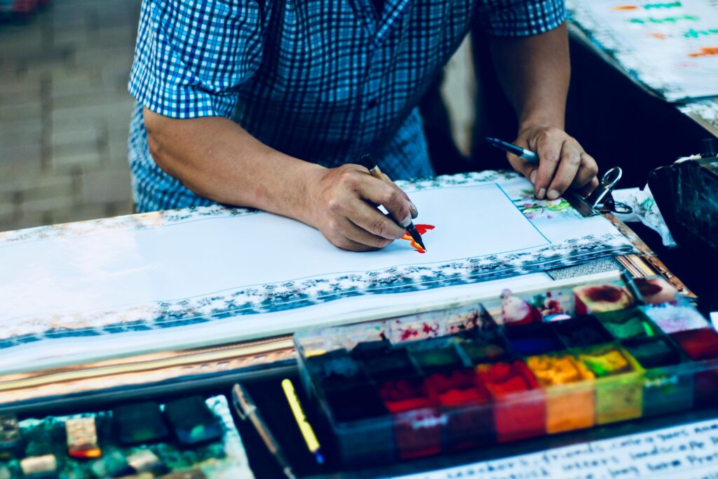 Man in blue and black button down top